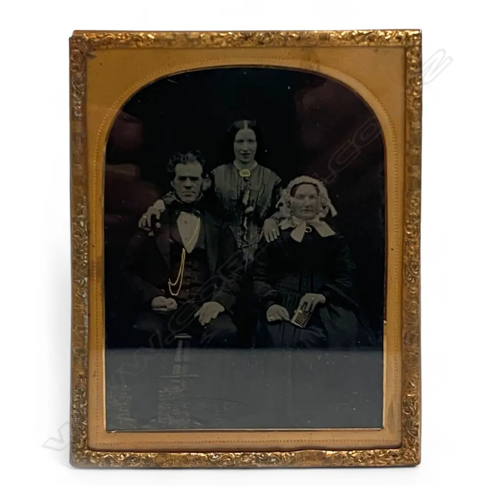 Gilt framed and matted ambrotype - Two women and man with gilded jewellery. 11 x 8.5mm. Image 1++